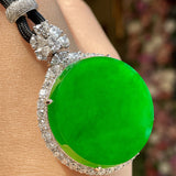 A Quality Circular Jadeite Pendant with Zirconia Surround and Cord